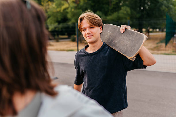 istock Skateboarders eating pizza 2229387171