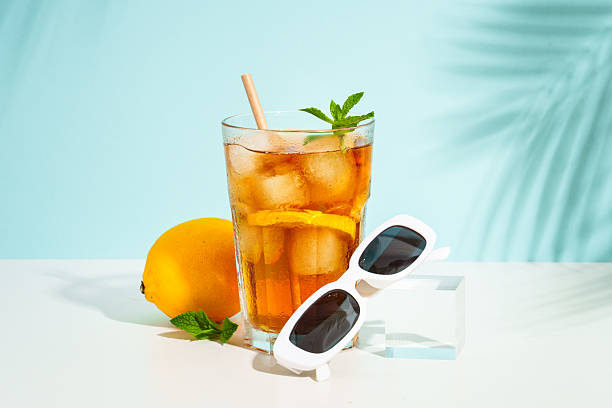 istock Summer cold drink on colored background with hard shadows. 2229390478