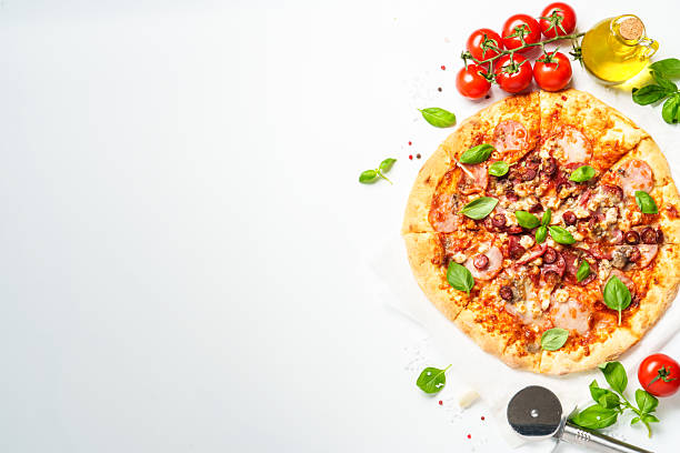istock Delicious meat pizza with ham, salami and sausages. 2229390621
