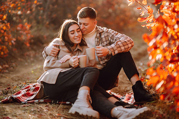 istock Two beautiful people enjoying time together in an autumn forest. 2229392469