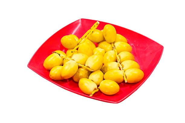 Isolated red plate with bunch of thai figs