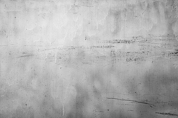 istock A textured, distressed wall with subtle imperfections and faint markings, perfect for adding a raw, industrial aesthetic to design projects. 2229401402