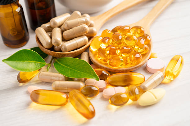 istock Alternative medicine herbal organic capsule drug herb. 2229405290