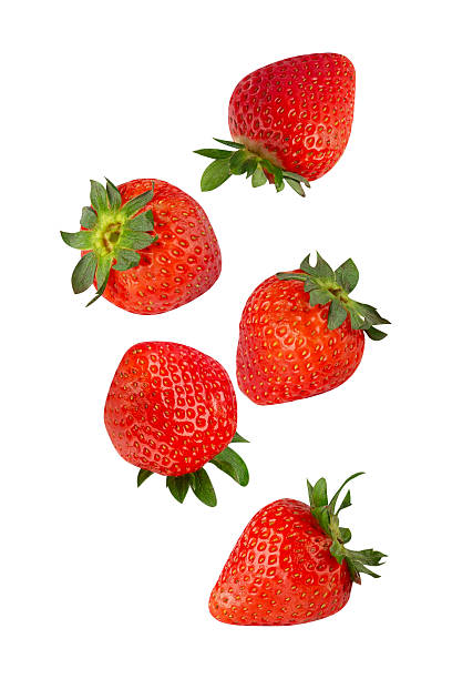 istock Falling Strawberry isolated on white background with clipping path, full depth of field 2229407155