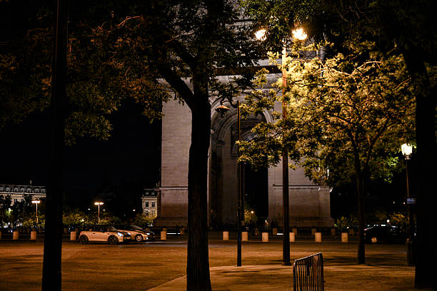 istock Arc de Triomphe night view with trees Paris France 2229407358