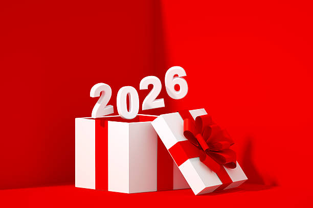 istock 2026 Flying out of Gift Box on Red Background 2229407859
