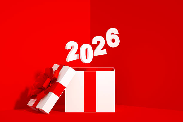 istock 2026 Flying out of Gift Box on Red Background 2229408448