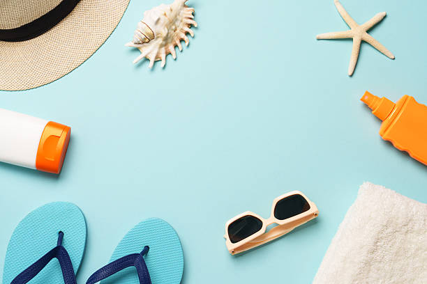 istock Beach cloth and accessories with sea shells on blue background. 2229413238