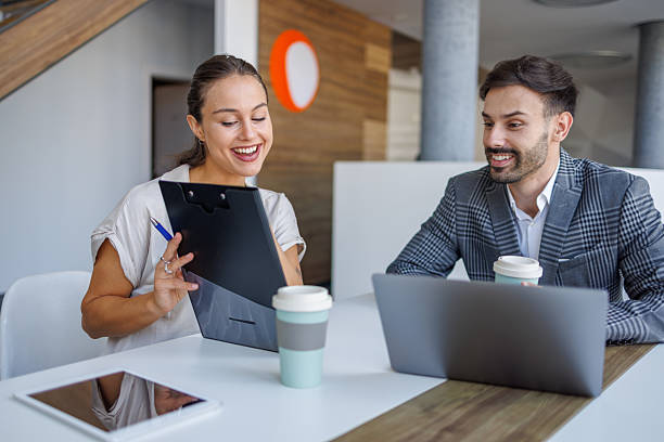 istock Business people working together on project in modern office 2229413899