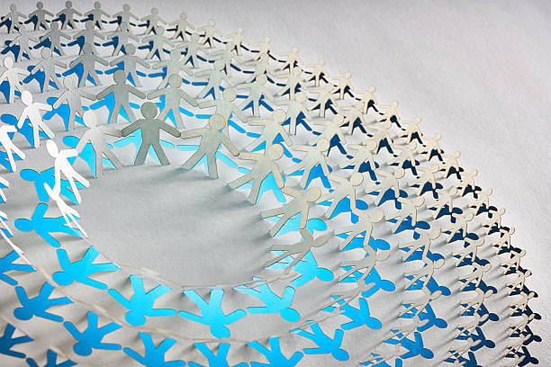 istock Concentric Paper Chain of Human Figures Symbolizing Unity and Connection 2229417605