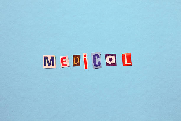 istock Medical word from cut magazine letters on blue background 2229429643