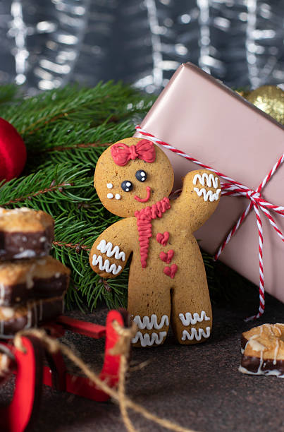 istock Cookies Gingerbread man on festive new year background 2229430851