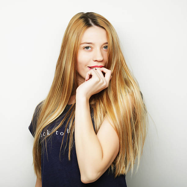istock Young cute smiling blond girl 2229432107