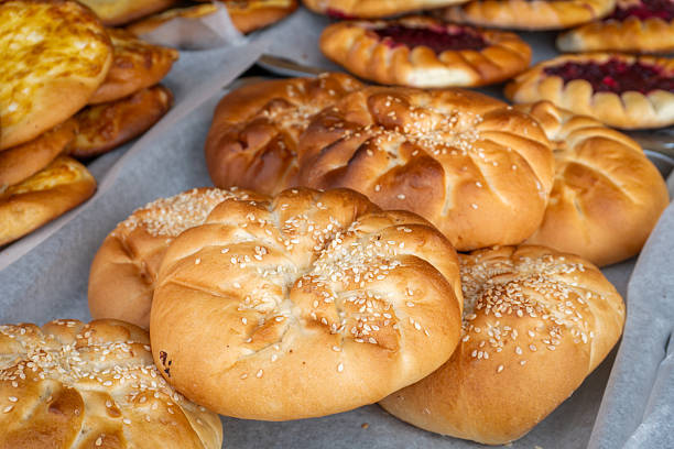 istock Freshly baked sesame rolls on a large tray 2229432791