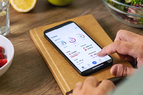 istock Man tracks health data during Healthy lifestyle 2229435573