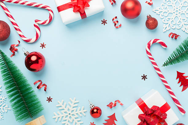 istock Christmas decor, gift boxes and confetti on color background, top view. Copy space for design 2229436404
