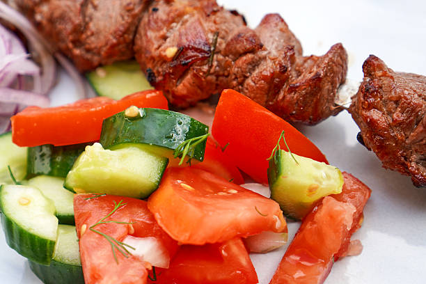 Salad of cucumbers, tomatoes, and onions