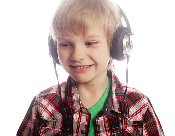 The young boy is enjoy the music