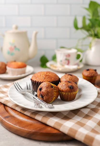 istock Tea time Banana cup cake with fork in white plate 2229443060