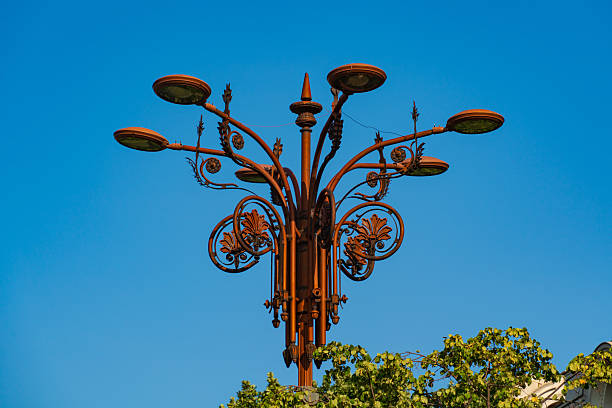 silhouette lamp post at dusk, night sky, modern look, led wrap violet