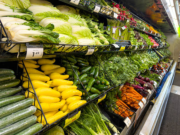 istock Fresh Vegetables Displayed in Grocery Store 2229444896