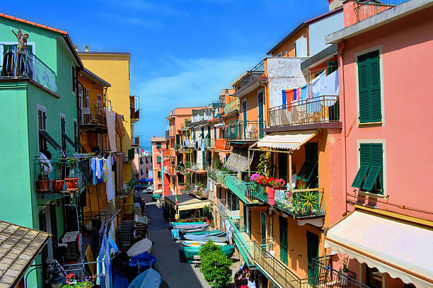 Main Street of Riomaggiore Cinque Terre Italy with Fishing Boats Waiting for the Sea to Calm.