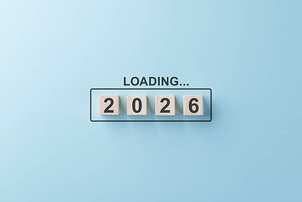 istock Loading 2026 New Year Progress Concept. Wooden blocks 2026 with the word Loading transition, planning, and preparation for 2026. business strategy, goal setting, new beginnings, future challenges, 2229452496