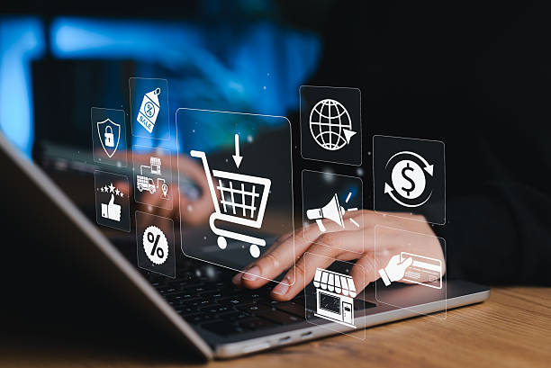 istock Online shopping and e-commerce technology internet concept. hands typing on a laptop surrounded by virtual icons representing e-commerce, online shopping, and digital marketing. Internet retail, 2229452504