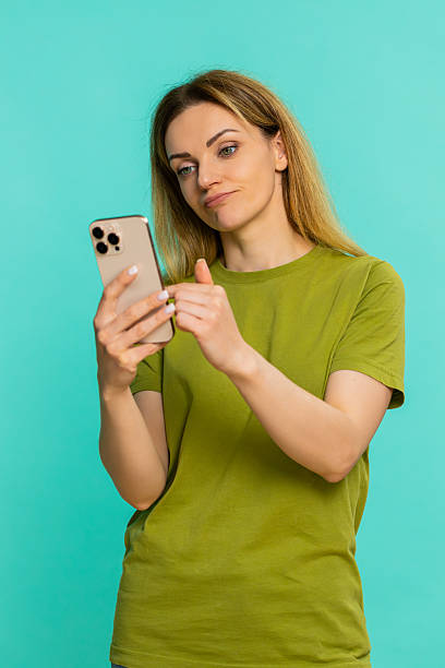 istock Woman tired scrolling smartphone feed feeling overwhelmed by social media content 2229453410