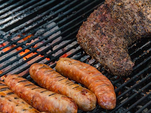 istock Grilling Sausages and Meat on BBQ 2229456942