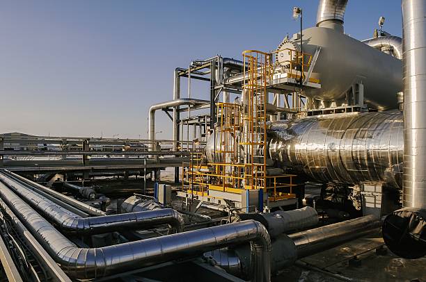 istock Interlacing of various pipes in an oil field. 2229457237