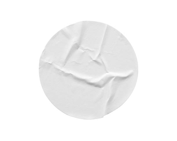 istock Blank white round paper sticker label isolated on white background 2229457670