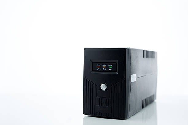 istock Uninterruptible power supply on white background. Backup Power UPS with battery. UPS with stabilizer for home PC. UPS inverter. Equipment for computer system at office for security. Power protection. 2229462040