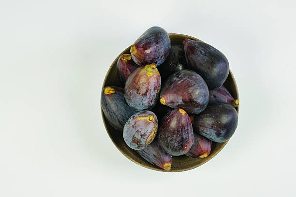 istock Fresh, natural figs isolated on white background. 2229462158