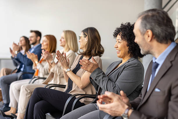 istock Professionals Applauding in a Positive Office Environment 2229462424