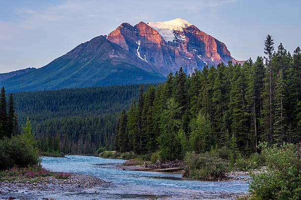 istock Turquoise river winding through forest with Mount Temple in Banff National Park 2229466822