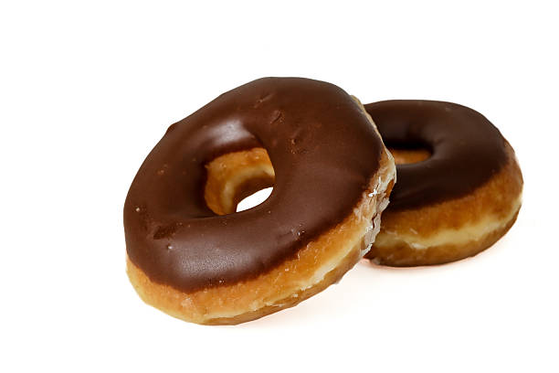 istock Donuts, chocolate, chocolate donuts, chocolate glaze, white background 2229469761