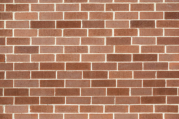 istock facade view of old brick wall background 2229471515