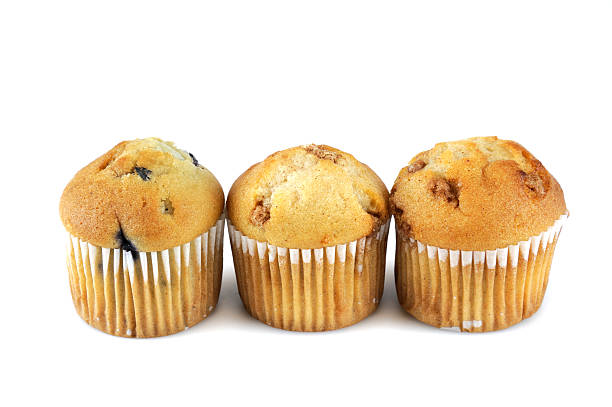 istock fresh baked small muffins isolated on white background 2229474249