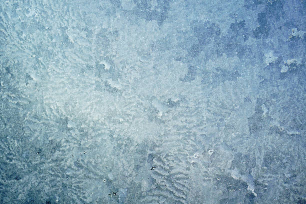 istock ice crystal background on the window in winter 2229481680