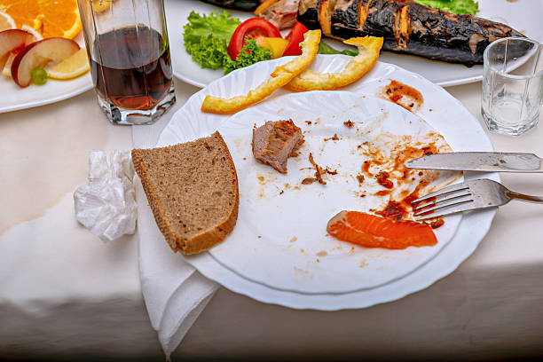 istock A plate of food on a table with a fork and knife 2229491971