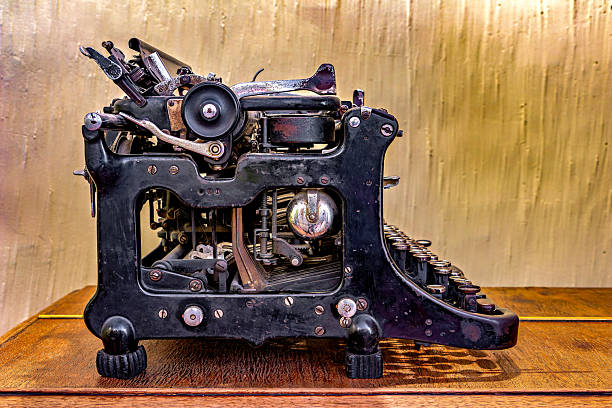 istock An old typewriter sitting on top of a wooden table 2229493499