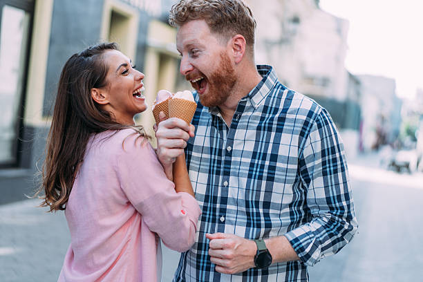 istock Lovely couple eating ice cream together. 2229493624