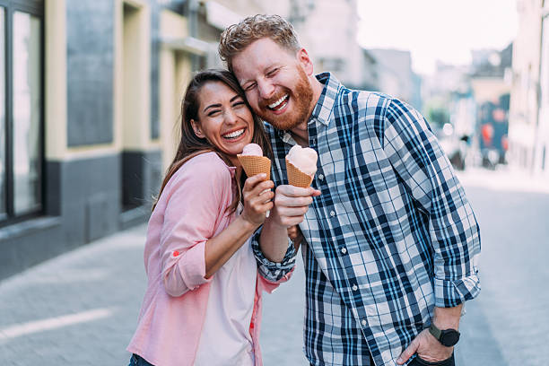 istock Lovely couple eating ice cream together. 2229493629