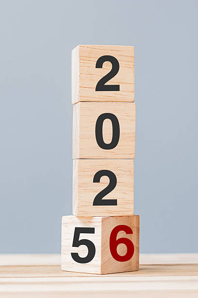 istock 2025 chang to 2026 wooden cube blocks on table background. Resolution, plan, review, goal, start, end year  and New Year holiday concepts 2229496620