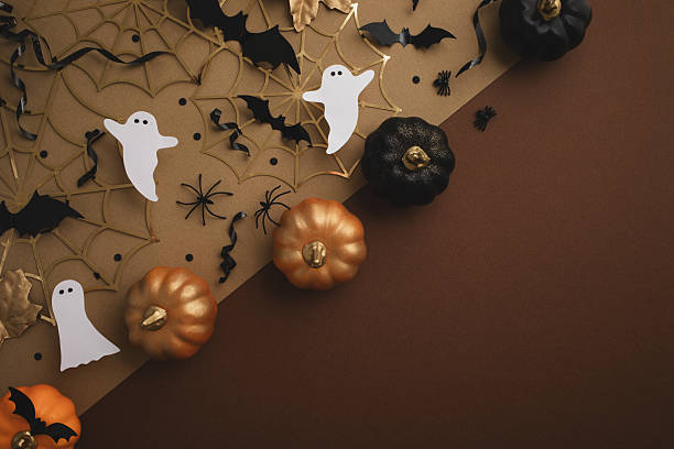 istock Happy halloween background with party decorations from pumpkins, bats, spiderweb, ghosts top view. Mystic autumn greeting card. 2229500345
