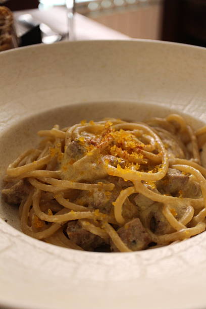 istock Italian cuisine: spaghetti with fish carbonara in Venice, Italy 2229502926