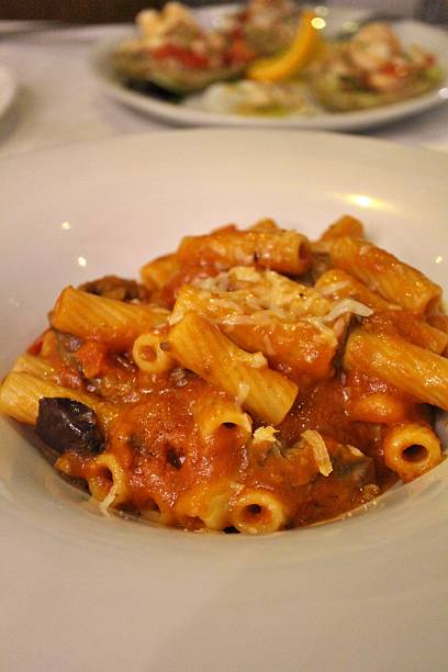 istock Italian cuisine: rigatoni with beef strips and tomato sauce in Venice, Italy 2229503046