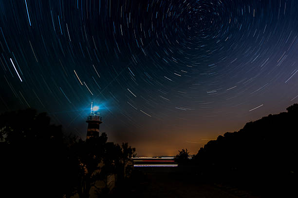 istock Sarpincik Lighthouse Night Star Exposure 2229503564