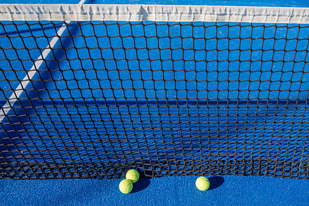 istock A Padel Lesson Scene with Balls on the Ground. Concept The process of learning and practice. 2229503627